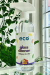 A bottle of eco glass cleaner in citrus, for a plant-based and eco-friendly cleaning routine.