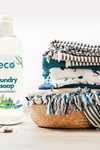 A bottle of eco laundry detergent in rosemary mint, for a plant-based and eco-friendly laundry routine.