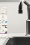 Eco Company dish soap by the sink for an sustainable dishwashing routine. 